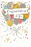 This upright congratulations card shows a front cover alive with festive yet elegant detail, much like a subtle party scene captured in stillness. At the centre, a generous bouquet of illustrated balloons rises in a loose cluster, their rounded forms rendered in muted metallic gold and silver, soft champagne, sky blue, palest pink and cool grey. Each balloon is individually decorated: some wear delicate stripes, others are sprinkled with tiny stars or fine, glitter-like particles that catch the light and lend a sense of texture, as though you could feel a slight shimmer under your fingertips. Slender strings in gleaming gold and silver spill from the base of each balloon, curling gracefully downward and gathering in a relaxed knot that echoes the tied ribbons on a celebratory bouquet delivered to a doorstep off the Upper Richmond Road. Across the middle of the balloon cluster, a white banner arcs gently, carrying the words Congratulations To You in classic, sweeping calligraphy that feels warm and heartfelt, as if chosen with care for someone's proud milestone in Mortlake or nearby Richmond. Around this focal arrangement, scattered metallic stars, tiny dots and swirling ribbon motifs drift across a pale, subtly textured background, creating the impression of confetti suspended in the air at the height of a celebration. The composition is airy yet meaningful, with colours that are joyful but not overpowering, evoking the quiet thrill of success shared with family and friends. It's the kind of card you might tuck beside a vase of fresh blooms on a windowsill overlooking the Thames, turning a simple delivery into a complete, memorable gesture of congratulations.